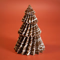 Little Christmas Tree in Belgian milk chocolate with a white chocolate drizzle, on a terracotta background