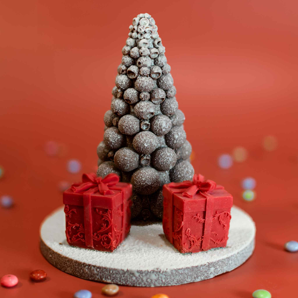 Snowed Bueno Bubble Tree in white velvet chocolate with red gift boxes