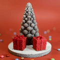 Snowed Bueno Bubble Tree in white velvet chocolate with red gift boxes